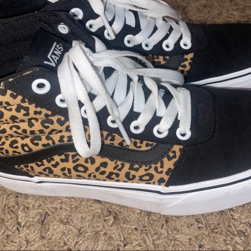 Woman’s high top vans